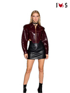 Vixen Cropped Corset Jacket in burgundy, styled with a black mini skirt